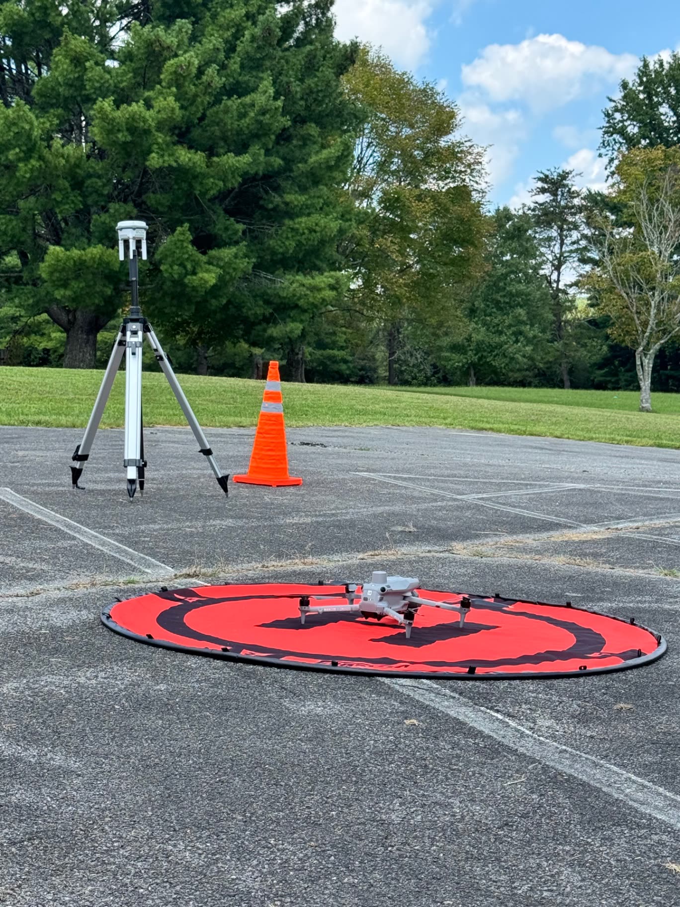 T-CAS Matrice 4E mapping aircraft and D-RTK base station during field setup